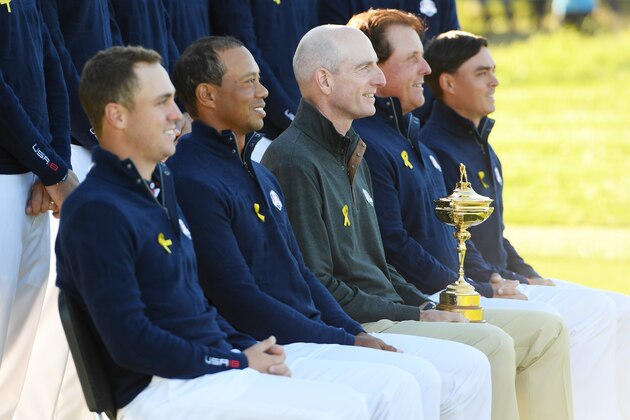 PARIS, FRANCE - SEPTEMBER 26:  Captain Jim Furyk of the United States holds the Ryder Cup trophy as he poses with his team during a photocall ahead of the 2018 Ryder Cup at Le Golf National on September 26, 2018 in Paris, France.  (Photo by Ross Kinnaird/Getty Images)