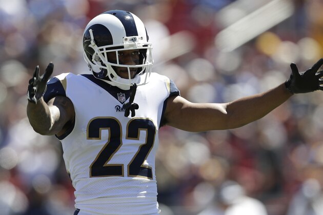 FILE - In this Sunday, Sept. 16, 2018, file photo, Los Angeles Rams cornerback Marcus Peters cheers during the first half of an NFL football game against the Arizona Cardinals in Los Angeles. The Chargers and the Rams  will meet on the Coliseum field Sunday for the first time since the two franchises’ relocations to Los Angeles.AP Photo/Marcio Jose Sanchez, File)