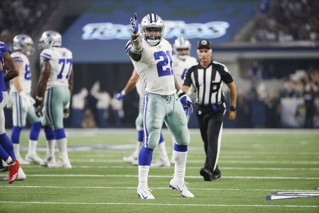 Dallas Cowboys running back Ezekiel Elliott (21) celebrates a first down during the second half of an NFL football game against the New York Giants in Arlington, Texas, Sunday, Sept. 16, 2018. (AP Photo/Ron Jenkins)