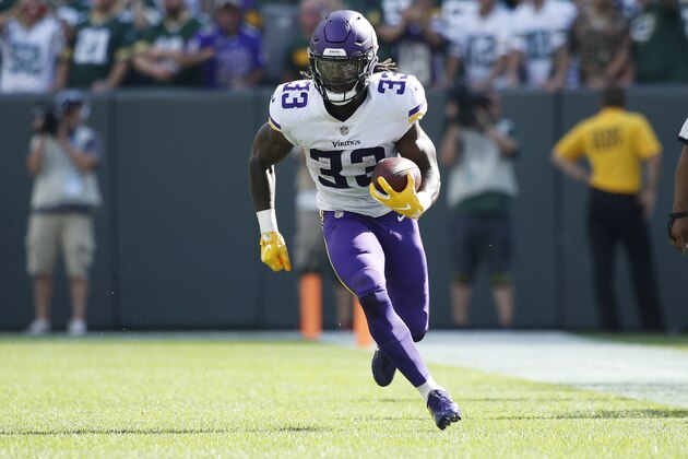 GREEN BAY, WI - SEPTEMBER 16: Dalvin Cook #33 of the Minnesota Vikings runs with the ball during the game against the Green Bay Packers at Lambeau Field on September 16, 2018 in Green Bay, Wisconsin. The game ended in a 29-29 tie. (Photo by Joe Robbins/Getty Images) GREEN BAY, WI - SEPTEMBER 16: Dalvin Cook #33 of the Minnesota Vikings runs with the ball during the game against the Green Bay Packers at Lambeau Field on September 16, 2018 in Green Bay, Wisconsin. The game ended in a 29-29 tie. (Photo by Joe Robbins/Getty Images)