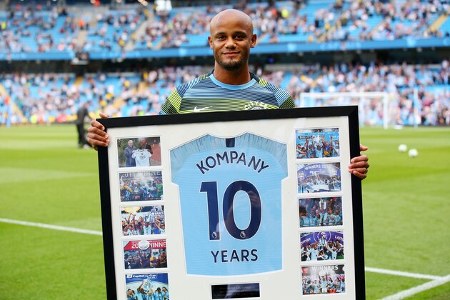 MANCHESTER, ENGLAND - SEPTEMBER 01:  Vincent Kompany of Manchester City poses with an award presented to him recognising his time spent playing for Manchester City prior to the Premier League match between Manchester City and Newcastle United at Etihad Stadium on September 1, 2018 in Manchester, United Kingdom.  (Photo by Alex Livesey/Getty Images)