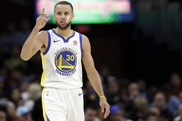 Golden State Warriors' Stephen Curry reacts during the second half of Game 3 of basketball's NBA Finals against the Cleveland Cavaliers, Wednesday, June 6, 2018, in Cleveland. (AP Photo/Tony Dejak)