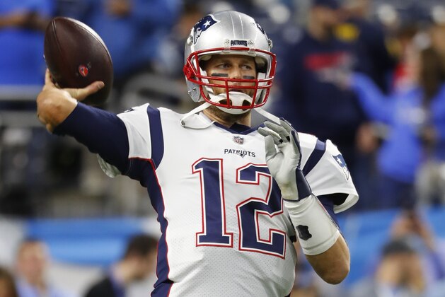 New England Patriots quarterback Tom Brady warms up before an NFL football game against the Detroit Lions in Detroit, Sunday, Sept. 23, 2018. (AP Photo/Paul Sancya)