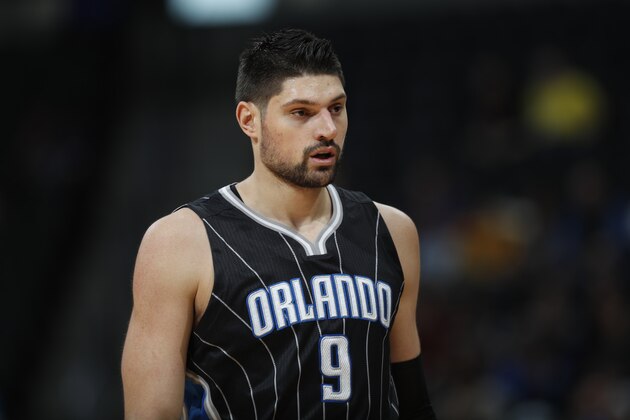 Orlando Magic center Nikola Vucevic (9) in the first half of an NBA basketball game Monday, Jan. 16, 2017, in Denver. (AP Photo/David Zalubowski)