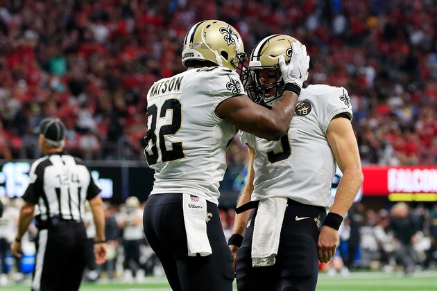 ATLANTA, GA - SEPTEMBER 23: Drew Brees #9 of the New Orleans Saints celebrates a rushing touchdown with Benjamin Watson #82 during the fourth quarter against the Atlanta Falcons at Mercedes-Benz Stadium on September 23, 2018 in Atlanta, Georgia. (Photo by Daniel Shirey/Getty Images)
