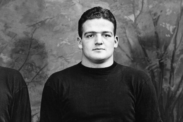 FILE - This is a 1937 file photo showing Yale football player Clint Frank. Laurie Dorsey remembers seeing her father's Heisman Trophy as a child. It was prominently displayed in the game room of the family’s house.  Her father, Clint Frank, won the award in 1937 as a running back and safety for Yale. Frank died in July 1992 at age 76, and his Heisman remained in the family all along. However, Dorsey, who now owns it along with a sister and two brothers, said they have decided to sell it. Frank's Heisman is part of Heritage Auctions' sports memorabilia offerings and is open for bidding through Oct.18. (AP Photo/File)