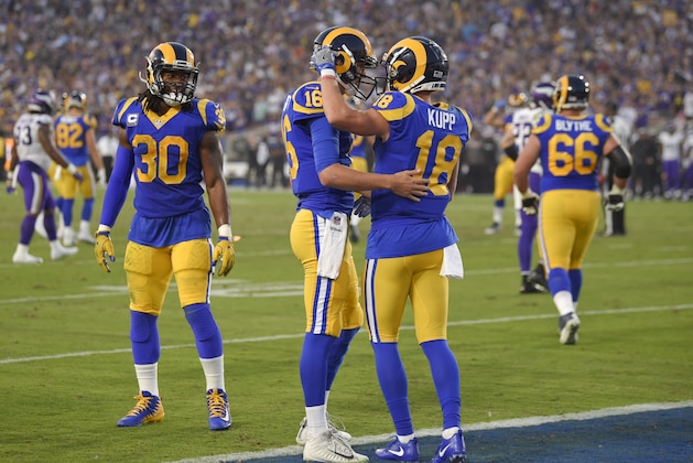 Los Angeles Rams wide receiver Cooper Kupp (18) celebrates after scoring with quarterback Jared Goff (16) during the first half in an NFL football game against the Minnesota Vikings Thursday, Sept. 27, 2018, in Los Angeles. (AP Photo/Mark J. Terrill)