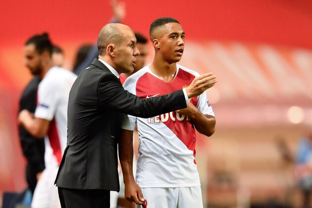 Monaco's Portuguese coach Leonardo Jardim (L) speaks with Monaco's Belgian midfielder Youri Tielemans (R) during the UEFA Champions League first round football match between AS Monaco and Atletico Madrid at the Stade Louis II, in Monaco, on September 18, 2018. (Photo by CHRISTOPHE SIMON / AFP)        (Photo credit should read CHRISTOPHE SIMON/AFP/Getty Images)