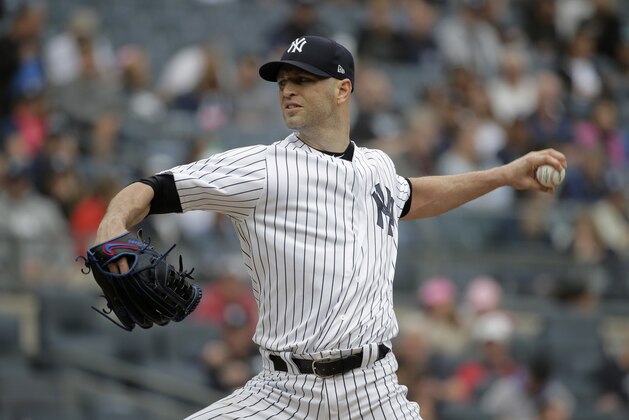 New York Yankees starting pitcher J.A. Happ throws during the first inning of a baseball game against the Baltimore Orioles at Yankee Stadium Sunday, Sept. 23, 2018, in New York. (AP Photo/Seth Wenig)