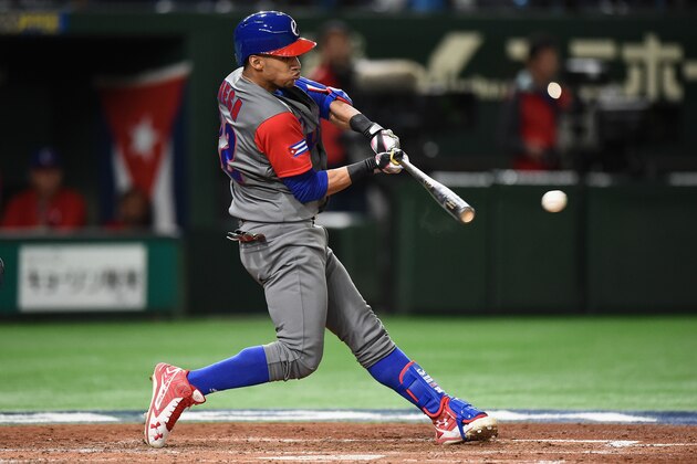 TOKYO, JAPAN - MARCH 14:  Outfielder Victor Mesa #32 of Cuba hits a two run single to make it 4-2 in the top of the fourth inning during the World Baseball Classic Pool E Game Four between Cuba and Japan at the Tokyo Dome on March 14, 2017 in Tokyo, Japan.  (Photo by Matt Roberts/Getty Images)