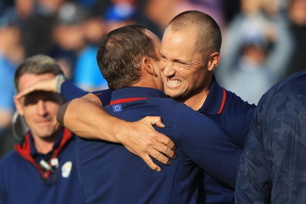 PARIS, FRANCE - SEPTEMBER 28: Alex Noren of Europe celebrates with Francesco Molinari of Europe during the afternoon foursome matches of the 2018 Ryder Cup at Le Golf National on September 28, 2018 in Paris, France.  (Photo by Andrew Redington/Getty Images)