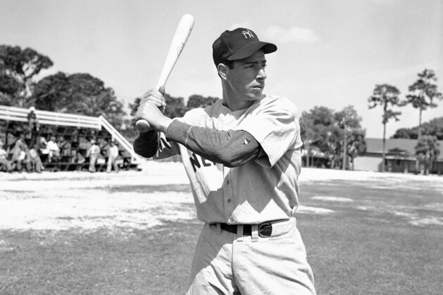 Joe DiMaggio with bat ready at first days workout on March 6, 1946 in Bradenton, Florida after returning from Panama.  DiMaggio has been out since 1942  for with U.S. Army service.   (AP Photo/PS)