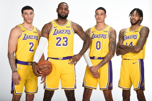 EL SEGUNDO, CA - SEPTEMBER 24: Lonzo Ball #2 LeBron James #23 Kyle Kuzma #0 and Brandon Ingram #14 of the Los Angeles Lakers pose for a portrait during media day at UCLA Health Training Center on September 24, 2018 in El Segundo, California. NOTE TO USER: User expressly acknowledges and agrees that, by downloading and/or using this Photograph, user is consenting to the terms and conditions of the Getty Images License Agreement. Mandatory Copyright Notice: Copyright 2018 NBAE (Photo by Andrew D. Bernstein/NBAE via Getty Images)