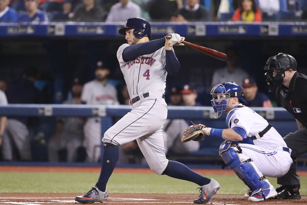 TORONTO, ON - SEPTEMBER 25: George Springer #4 of the Houston Astros hits a single in the first inning during MLB game action against the Toronto Blue Jays at Rogers Centre on September 25, 2018 in Toronto, Canada. (Photo by Tom Szczerbowski/Getty Images)
