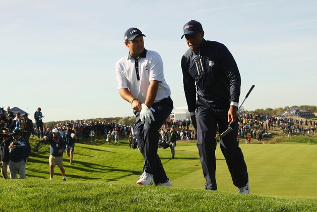 PARIS, FRANCE - SEPTEMBER 29:  Tiger Woods of the United States and Patrick Reed of the United States on the 11th during the morning fourball matches of the 2018 Ryder Cup at Le Golf National on September 29, 2018 in Paris, France.  (Photo by Jamie Squire/Getty Images)