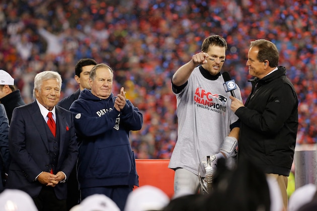 FOXBORO, MA - JANUARY 22:  Jim Nantz (R) interviews Tom Brady #12 of the New England Patriots as team owner Robert Kraft (L) and head coach Bill Belichick (2nd-L) look on after the Patriots defeated the Pittsburgh Steelers 36-17 to win the AFC Championship Game at Gillette Stadium on January 22, 2017 in Foxboro, Massachusetts.  (Photo by Jim Rogash/Getty Images)