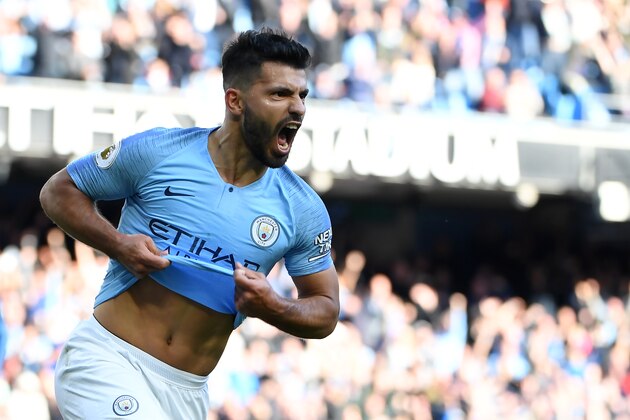 Manchester City's Argentinian striker Sergio Aguero celebrates after scoring the team's second goal during the English Premier League football match between Manchester City and Brighton and Hove Albion at the Etihad Stadium in Manchester, north west England, on September 29, 2018. (Photo by Paul ELLIS / AFP) / RESTRICTED TO EDITORIAL USE. No use with unauthorized audio, video, data, fixture lists, club/league logos or 'live' services. Online in-match use limited to 120 images. An additional 40 images may be used in extra time. No video emulation. Social media in-match use limited to 120 images. An additional 40 images may be used in extra time. No use in betting publications, games or single club/league/player publications. /         (Photo credit should read PAUL ELLIS/AFP/Getty Images)