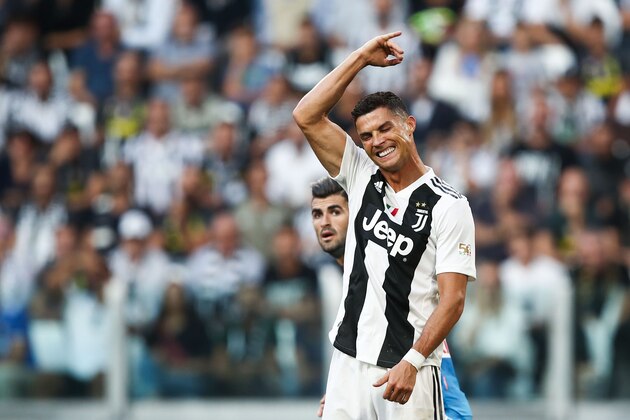 Juventus' Portuguese forward Cristiano Ronaldo reacts during the Italian Serie A football match Juventus vs Napoli on September 29, 2018 at the Juventus stadium in Turin. (Photo by Isabella BONOTTO / AFP)        (Photo credit should read ISABELLA BONOTTO/AFP/Getty Images)