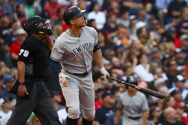 BOSTON, MA - SEPTEMBER 29:  Giancarlo Stanton #27 of the New York Yankees looks on after hitting a home run in the top of the seventh inning of the game against the Boston Red Sox at Fenway Park on September 29, 2018 in Boston, Massachusetts.  (Photo by Omar Rawlings/Getty Images)