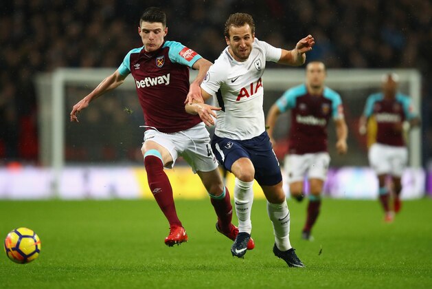 LONDON, ENGLAND - JANUARY 04:  Harry Kane of Spurs battles with Declan Rice of West Ham during the Premier League match between Tottenham Hotspur and West Ham United at Wembley Stadium on January 4, 2018 in London, England.  (Photo by Julian Finney/Getty Images)