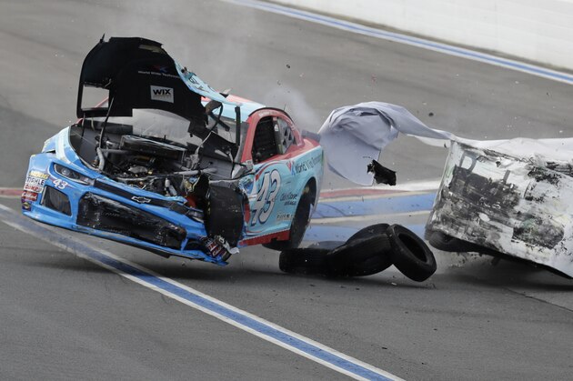Bubba Wallace crashes in Turn 12 during practice for Sunday's NASCAR Cup Series auto race at Charlotte Motor Speedway in Concord, N.C., Saturday, Sept. 29, 2018. (AP Photo/Chuck Burton)