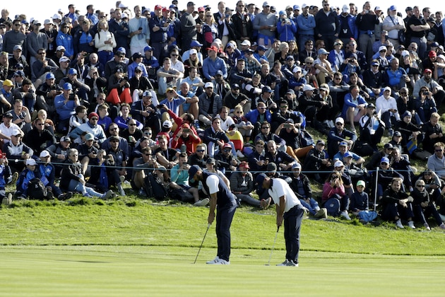 US golfer Dustin Johnson (L) and US golfer Brooks Koepka practice a shot  during their foursomes match on the second day of the 42nd Ryder Cup at Le Golf National Course at Saint-Quentin-en-Yvelines, south-west of Paris, on September 29, 2018. (Photo by Geoffroy VAN DER HASSELT / AFP)        (Photo credit should read GEOFFROY VAN DER HASSELT/AFP/Getty Images)