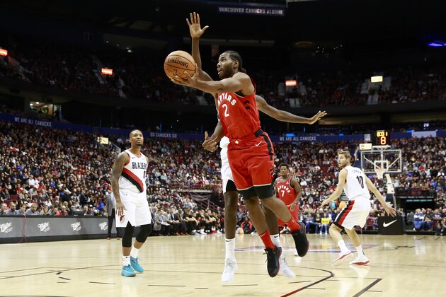 VANCOUVER, BC - SEPTEMBER 29: Kawhi Leonard #2 of the Toronto Raptors goes up for a lay up against the Portland Trail Blazers during a preseason game on September 29, 2018 at Rogers Arena in Vancouver, British Columbia, Canada. NOTE TO USER: User expressly acknowledges and agrees that, by downloading and or using this photograph, user is consenting to the terms and conditions of Getty Images License Agreement. Mandatory Copyright Notice: Copyright 2018 NBAE (Photo by Jeff Vinnick/NBAE via Getty Images)