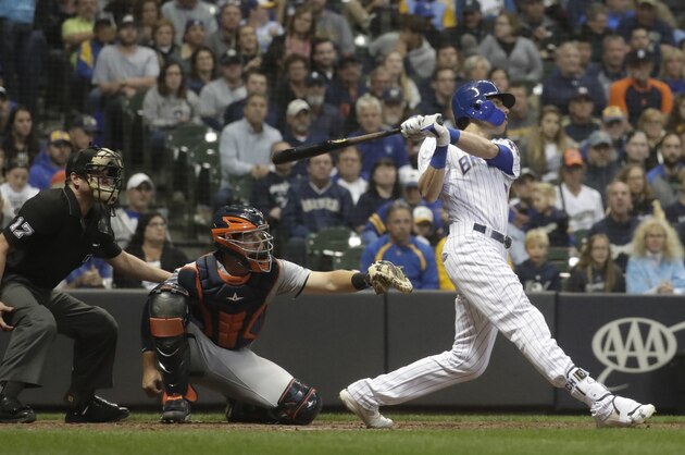 Milwaukee Brewers' Christian Yelich hits a home run during the seventh inning of a baseball game against the Detroit Tigers Saturday, Sept. 29, 2018, in Milwaukee. (AP Photo/Morry Gash)