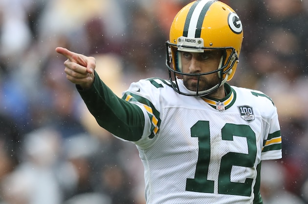 LANDOVER, MD - SEPTEMBER 23: Aaron Rodgers #12 of the Green Bay Packers celebrates after throwing a second quarter touchdown pass against the Washington Redskins at FedExField on September 23, 2018 in Landover, Maryland. (Photo by Rob Carr/Getty Images)