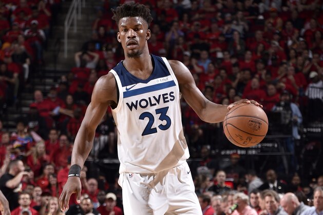 HOUSTON, TX - APRIL 25: Jimmy Butler #23 of the Minnesota Timberwolves handles the ball against the Houston Rockets in Game Five of the Western Conference Quarterfinals during the 2018 NBA Playoffs on April 25, 2018 at the Toyota Center in Houston, Texas. NOTE TO USER: User expressly acknowledges and agrees that, by downloading and/or using this photograph, user is consenting to the terms and conditions of the Getty Images License Agreement. Mandatory Copyright Notice: Copyright 2018 NBAE (Photo by Bill Baptist/NBAE via Getty Images)