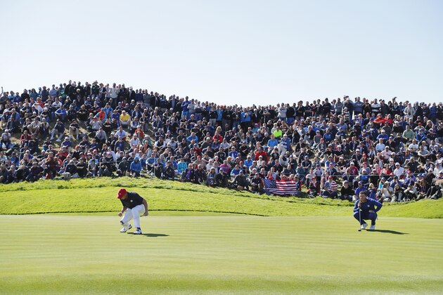 PARIS, FRANCE - SEPTEMBER 30: Justin Thomas of the United States celebrates on the green during singles matches of the 2018 Ryder Cup at Le Golf National on September 30, 2018 in Paris, France.  (Photo by Richard Heathcote/Getty Images)