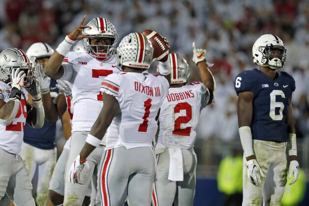 STATE COLLEGE, PA - SEPTEMBER 29:  Dwayne Haskins #7 of the Ohio State Buckeyes celebrates with Johnnie Dixon #1 after defeating the Penn State Nittany Lions  on September 29, 2018 at Beaver Stadium in State College, Pennsylvania.  (Photo by Justin K. Aller/Getty Images)