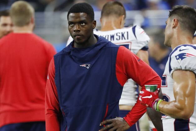 New England Patriots wide receiver Josh Gordon watches from the sidelines during the first half of an NFL football game against the Detroit Lions, Sunday, Sept. 23, 2018, in Detroit. (AP Photo/Paul Sancya)