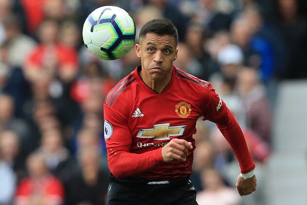 Manchester United's Chilean striker Alexis Sanchez chases the ball during the English Premier League football match between Manchester United and Wolverhampton Wanderers at Old Trafford in Manchester, north west England, on September 22, 2018. (Photo by Lindsey PARNABY / AFP) / RESTRICTED TO EDITORIAL USE. No use with unauthorized audio, video, data, fixture lists, club/league logos or 'live' services. Online in-match use limited to 120 images. An additional 40 images may be used in extra time. No video emulation. Social media in-match use limited to 120 images. An additional 40 images may be used in extra time. No use in betting publications, games or single club/league/player publications. /         (Photo credit should read LINDSEY PARNABY/AFP/Getty Images)