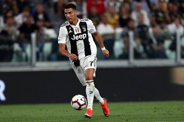 TURIN, ITALY - SEPTEMBER 29: Cristiano Ronaldo of Juventus in action during the Srie A match between Juventus and SSC Napoli  at Allianz Stadium on September 29, 2018 in Turin, Italy.  (Photo by Gabriele Maltinti/Getty Images )