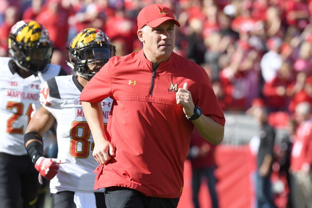 MADISON, WI - OCTOBER 21:  Head Coach DJ Durkin of the Maryland Terrapins runs onto the field before the game against the Wisconsin Badgers at Camp Randall Stadium on October 21, 2017 in Madison, Wisconsin.  (Photo by G Fiume/Maryland Terrapins/Getty Images)