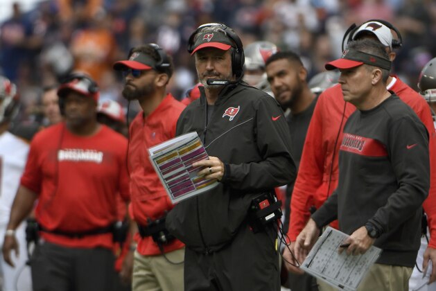 Tampa Bay Buccaneers head coach Dirk Koetter watches during the first half of an NFL football game against the Chicago Bears Sunday, Sept. 30, 2018, in Chicago. (AP Photo/David Banks)