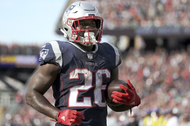 New England Patriots running back Sony Michel runs for a touchdown during the second half of an NFL football game against the Miami Dolphins, Sunday, Sept. 30, 2018, in Foxborough, Mass. (AP Photo/Elise Amendola)