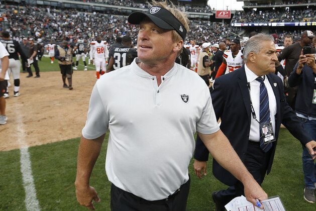Oakland Raiders head coach Jon Gruden walks off the field after an NFL football game between the Raiders and the Cleveland Browns in Oakland, Calif., Sunday, Sept. 30, 2018. The Raiders won 45-42 in overtime. (AP Photo/D. Ross Cameron)