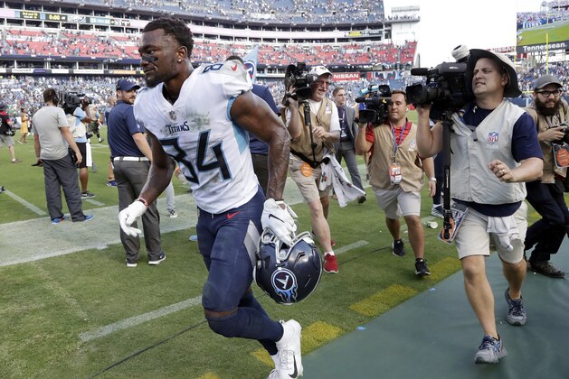 Tennessee Titans wide receiver Corey Davis (84) runs off the field after catching the winning touchdown pass against the Philadelphia Eagles in overtime of an NFL football game Sunday, Sept. 30, 2018, in Nashville, Tenn. The Titans won 26-23. (AP Photo/James Kenney)