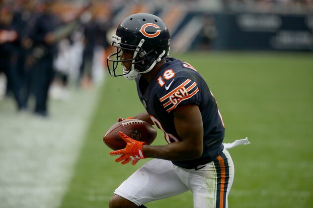 CHICAGO, IL - SEPTEMBER 30:  Taylor Gabriel #18 of the Chicago Bears runs the football in for a touchdown against the Tampa Bay Buccaneers in the third quarter at Soldier Field on September 30, 2018 in Chicago, Illinois.  (Photo by Jonathan Daniel/Getty Images)
