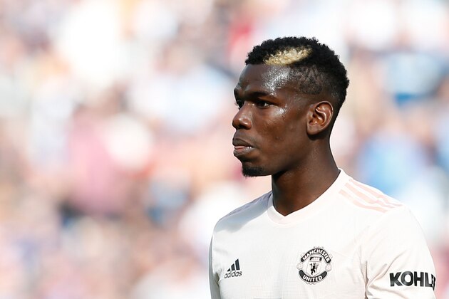 Manchester United's French midfielder Paul Pogba leaves the pitch substituted during the English Premier League football match between West Ham United and Manchester United at The London Stadium, in east London on September 29, 2018. (Photo by Ian KINGTON / AFP) / RESTRICTED TO EDITORIAL USE. No use with unauthorized audio, video, data, fixture lists, club/league logos or 'live' services. Online in-match use limited to 120 images. An additional 40 images may be used in extra time. No video emulation. Social media in-match use limited to 120 images. An additional 40 images may be used in extra time. No use in betting publications, games or single club/league/player publications. /         (Photo credit should read IAN KINGTON/AFP/Getty Images)