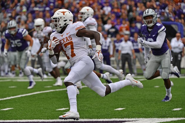 MANHATTAN, KS - SEPTEMBER 29:  Defensive back D'Shawn Jamison #17 of the Texas Longhorns returns a punt for a touch down during the first half against the Kansas State Wildcats on September 29, 2018 at Bill Snyder Family Stadium in Manhattan, Kansas.  (Photo by Peter G. Aiken/Getty Images)
