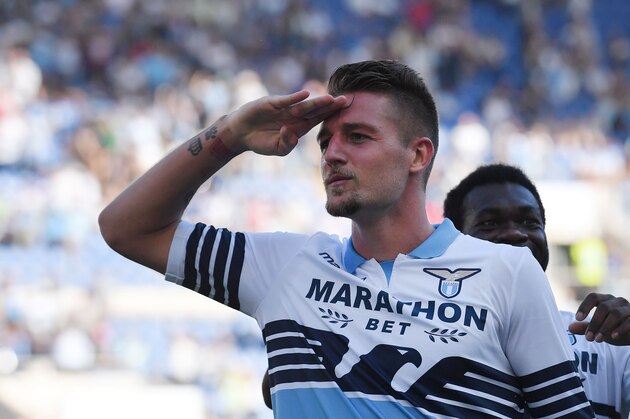 Lazio's Serbian midfielder Sergej Milinkovic-Savic   celebrates after scoring a goal  during the Italian Serie A football match between SS Lazio and Genoa CFC at the Olympic Stadium in Rome on September 23, 2018. (Photo by Tiziana FABI / AFP)        (Photo credit should read TIZIANA FABI/AFP/Getty Images)