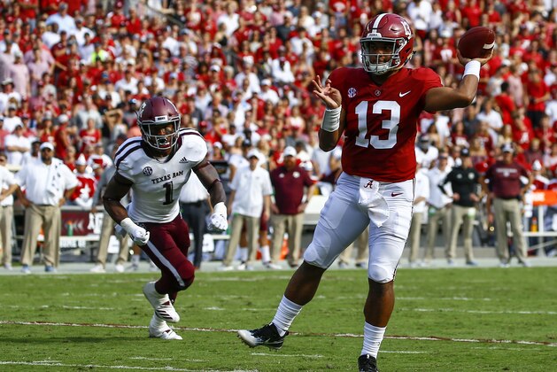Alabama quarterback Tua Tagovailoa (13) throws a touchdown pass against Texas A&M during the first half of an NCAA college football game, Saturday, Sept. 22, 2018, in Tuscaloosa, Ala. (AP Photo/Butch Dill)