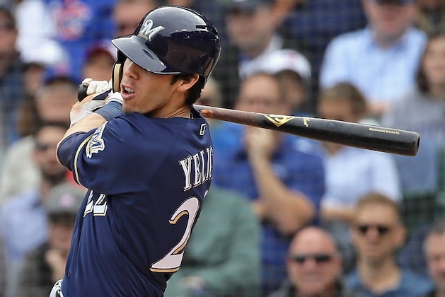 CHICAGO, IL - OCTOBER 01:    Christian Yelich #22 of the Milwaukee Brewers hits a run scoring single in the 3rd inning against the Chicago Cubs during the National League Tiebreaker Game at Wrigley Field on October 1, 2018 in Chicago, Illinois. (Photo by Jonathan Daniel/Getty Images)