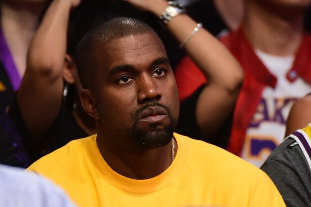 LOS ANGELES, CA - APRIL 13:  Kanye West looks on as he watches as the Los Angeles Lakers take on the Utah Jazz at Staples Center on April 13, 2016 in Los Angeles, California. NOTE TO USER: User expressly acknowledges and agrees that, by downloading and or using this photograph, User is consenting to the terms and conditions of the Getty Images License Agreement.  (Photo by Harry How/Getty Images)