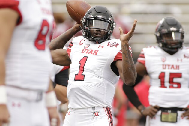 Utah quarterback Tyler Huntley (1) throws a pass during warm ups before an NCAA college football game against Washington State in Pullman, Wash., Saturday, Sept. 29, 2018. (AP Photo/Young Kwak)