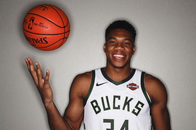 Milwaukee Bucks' Giannis Antetokounmpo poses for a photograph during media day at the NBA basketball team's new arena Monday, Sept. 24, 2018, in Milwaukee. (AP Photo/Morry Gash)