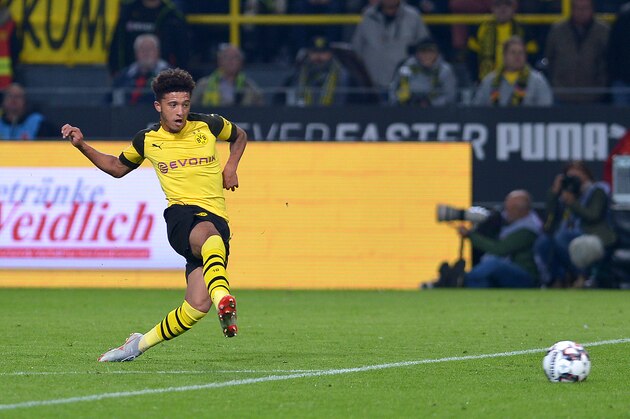 DORTMUND, GERMANY - SEPTEMBER 26: Jadon Sancho of Borussia Dortmund scores the team`s sixth goal during the Bundesliga match between Borussia Dortmund and 1. FC Nuernberg at Signal Iduna Park on September 26, 2018 in Dortmund, Germany. (Photo by TF-Images/Getty Images)